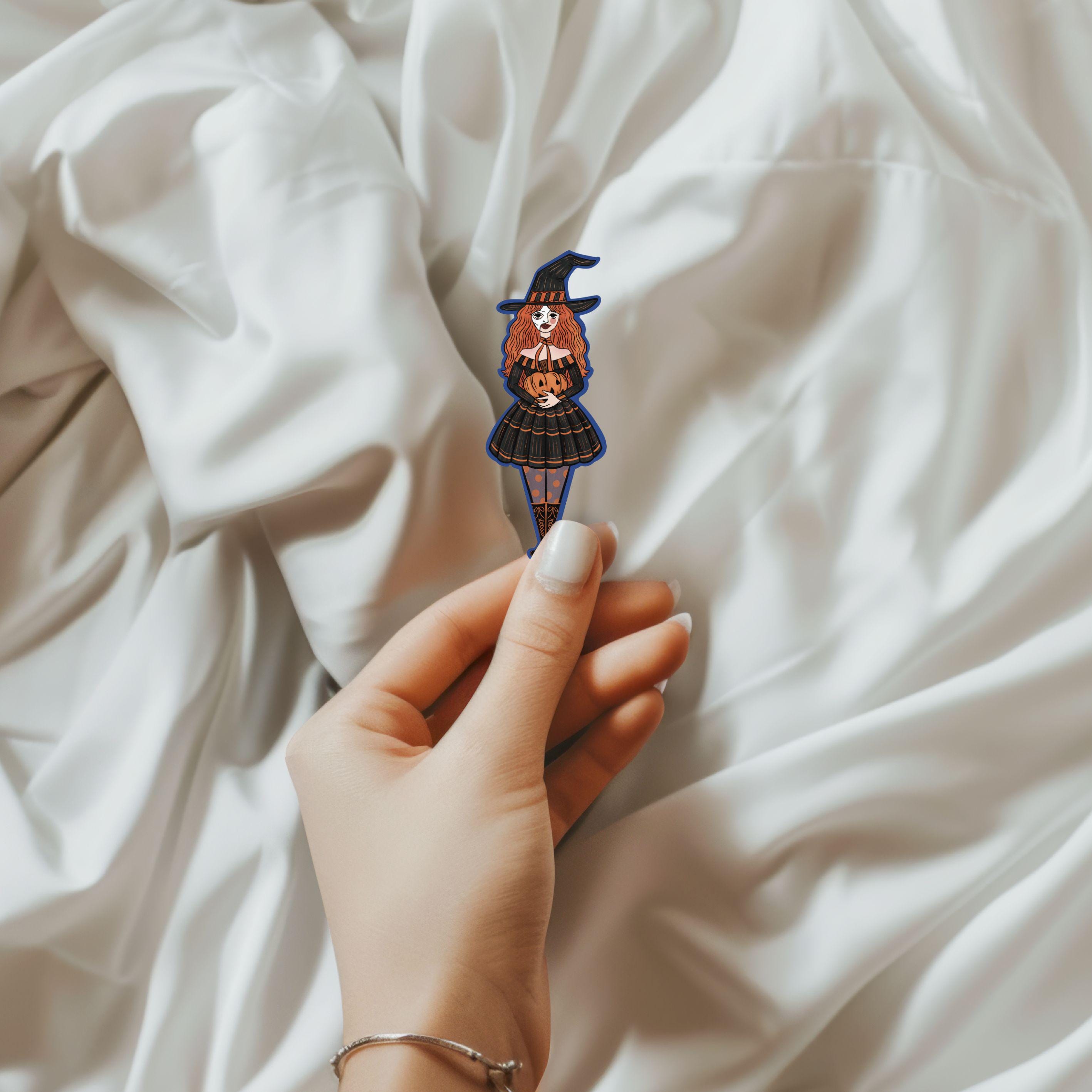 Witch Girl With Phantom of the Opera Mask Holding a Pumpkin Sticker Retro Cute Illustration made of Waterproof Matte Vinyl ST048